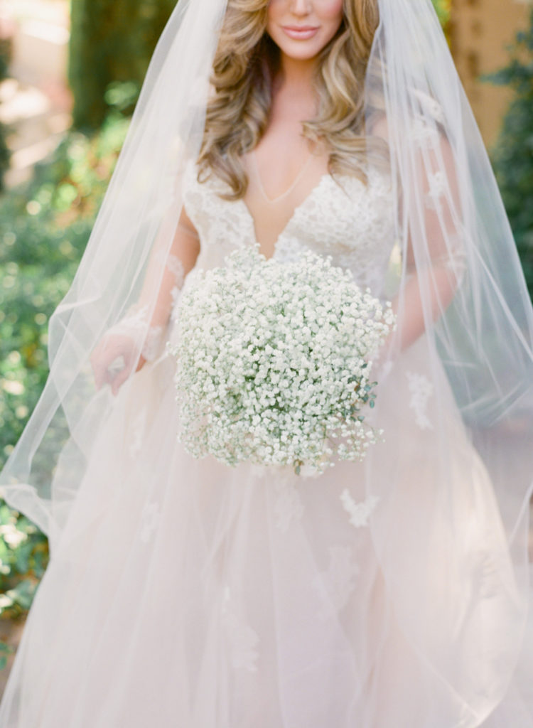 L'Auberge De Sedona Wedding -Bride in wedding dress holding her bouquet
