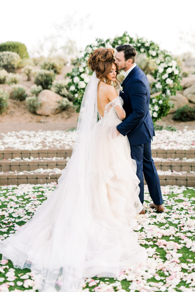 Bride and groom kissing Arizona wedding